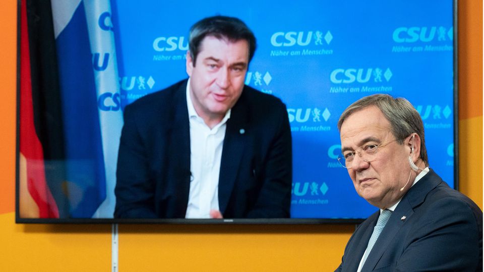 Markus Söder, CSU-Parteichef (im Hintergrund), und CDU-Parteichef Armin Laschet