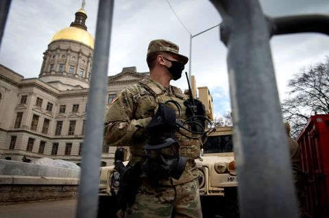 Washington : Geisterstadt und Kriegszone: Eindrücke aus einer Stadt an einem historischen Tag