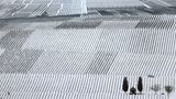 Reben bis zum Horizont im Schnee: Die Weinberge an der Mainschleife bei Nordheim in Nordbayern.