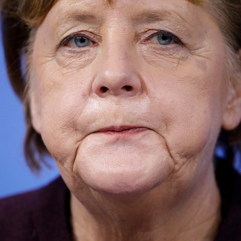 Angela Merkel reagiert während einer Pressekonferenz