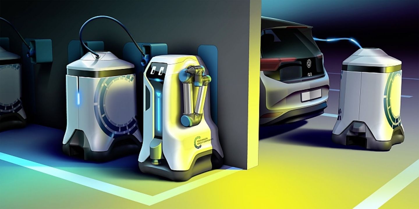 Während der Wagen parkt, nimmt der elektrische Transporter eine volle Ladeeinheit huckepack und fährt sie zum Auto