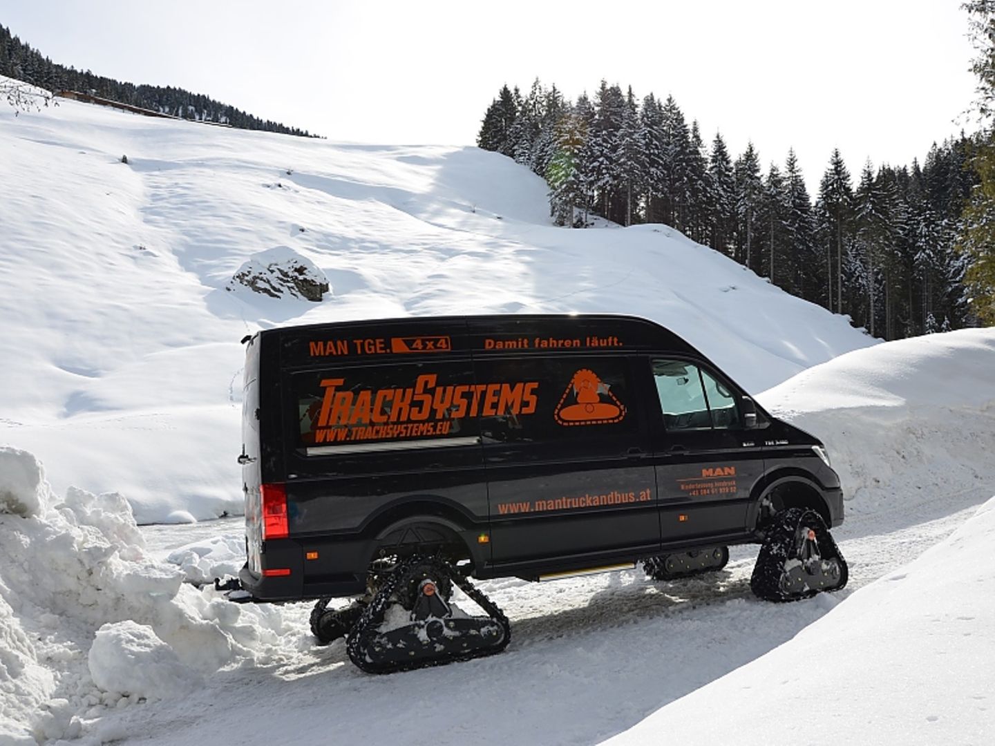 MAN TGE 4x4 mit Raupenantrieb