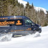 MAN TGE 4x4 mit Raupenantrieb