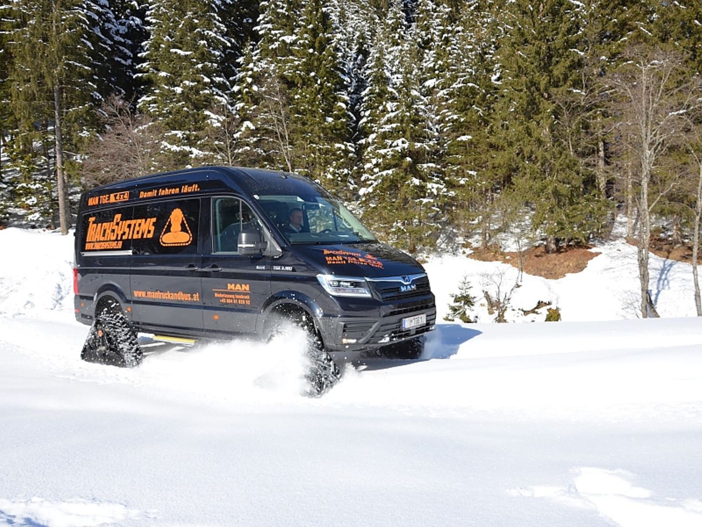 MAN TGE 4x4 mit Raupenantrieb