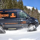 MAN TGE 4x4 mit Raupenantrieb