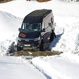 MAN TGE 4x4 mit Raupenantrieb