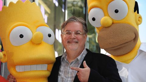 Matt Groening mit den von ihm erschaffenen Figuren Bart (l.) und Homer Simpson