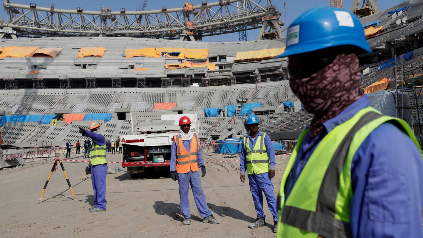 Construction workers work on the Lusail stadium, one of the stadiums for the 2022 world Cup