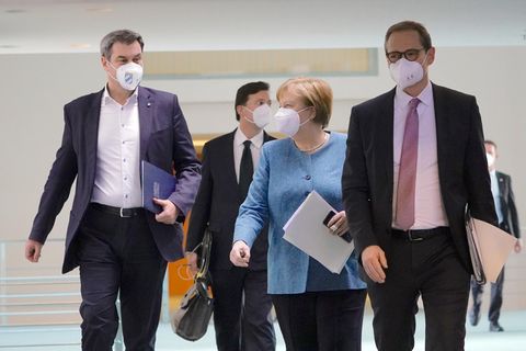 Angela Merkel, Markus Söder, Michael Müller