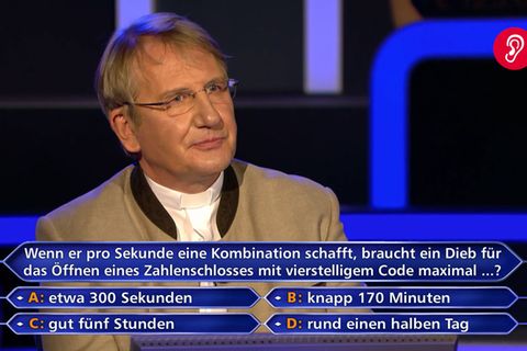 Martin Fohl sitzt im Wer wird Millionär Studio in Köln auf dem Ratestuhl