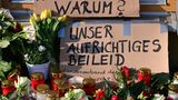 Blumen und ein Schild in Potsdam