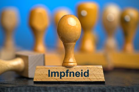 Ein Stempel mit der Aufschrift Impfneid