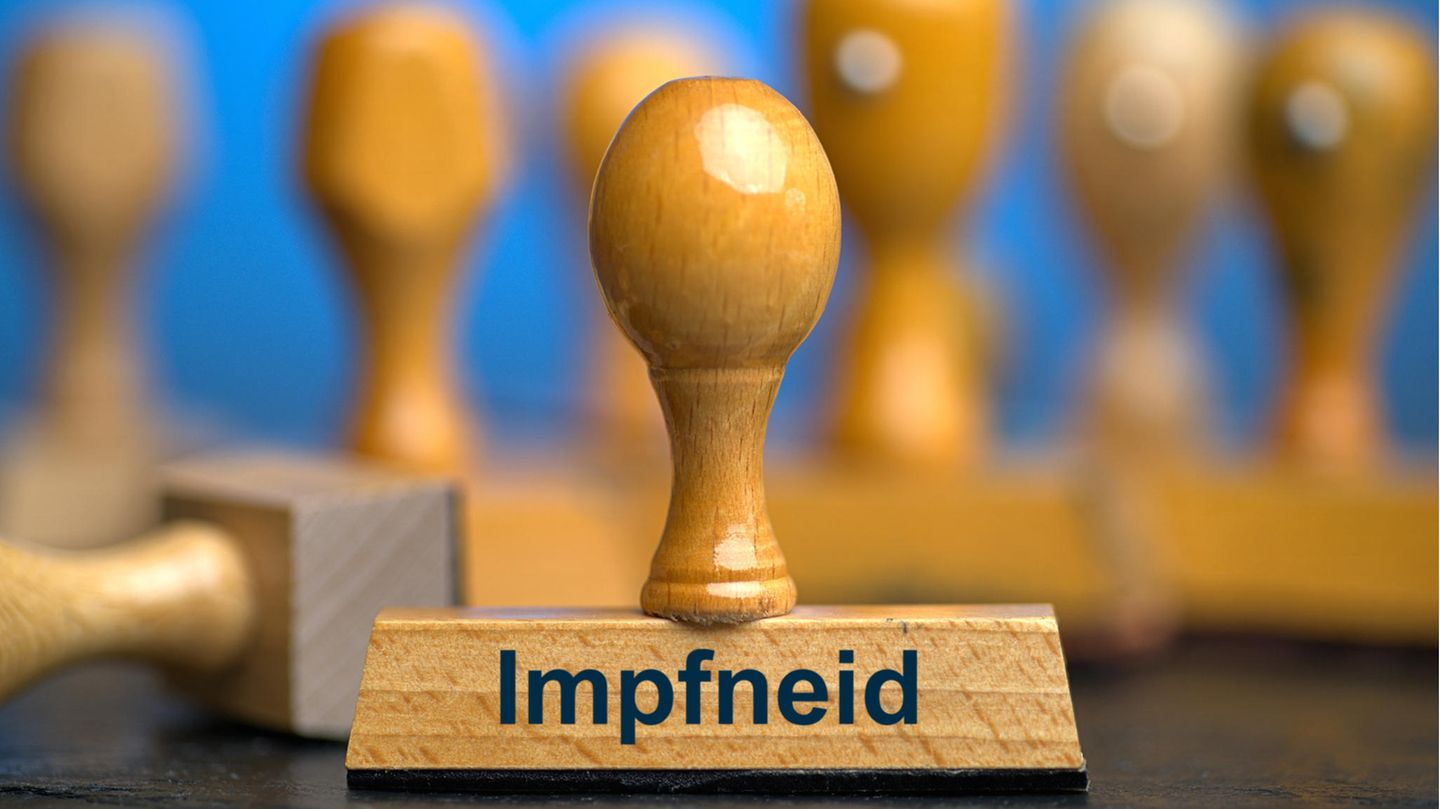 Ein Stempel mit der Aufschrift Impfneid