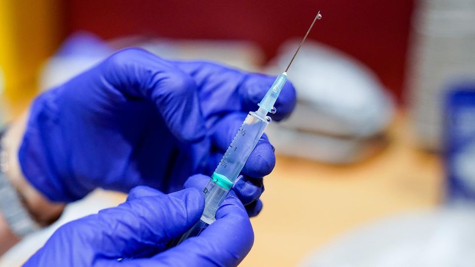 Syringe with vaccine from Biontech / Pfizer