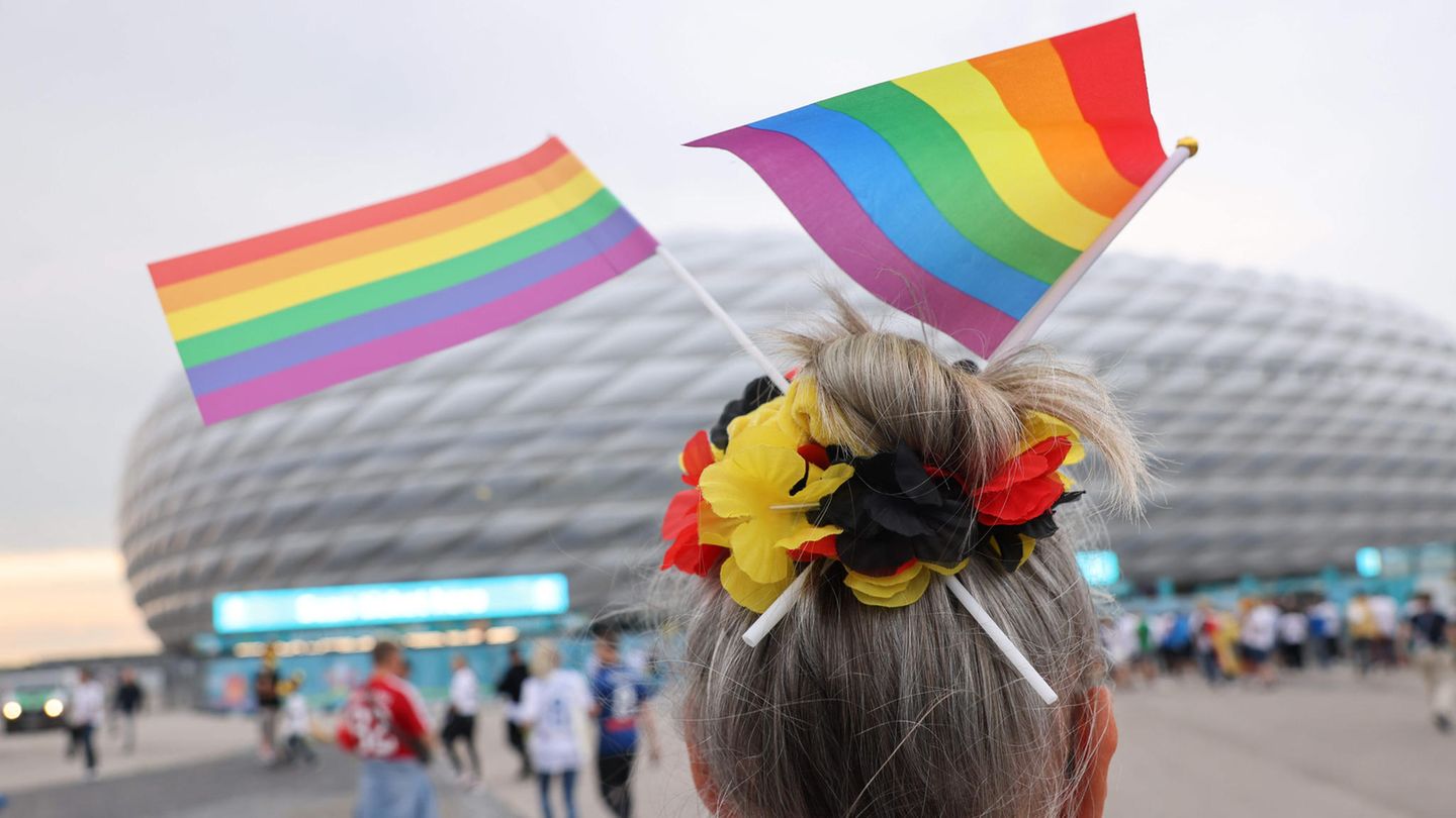 In front of Munich's Allianz Arena, many fans showed up with rainbow flags despite the Uefa ban