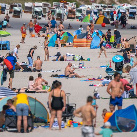 Menschen am Strand