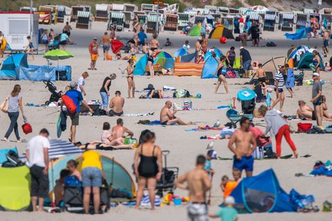Menschen am Strand