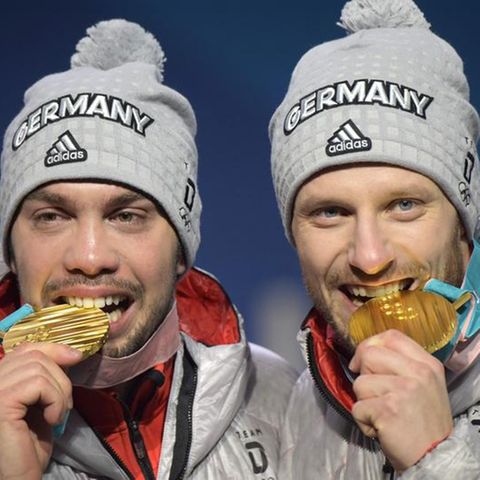 Deutsche Rennrodler mit Goldmedaillen