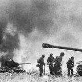 Deutsche Truppen inmitten sowjetischer Panzerwracks.