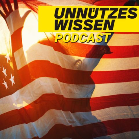 Zwei Menschen mit US-amerikanischer Flagge im Sonnenlicht