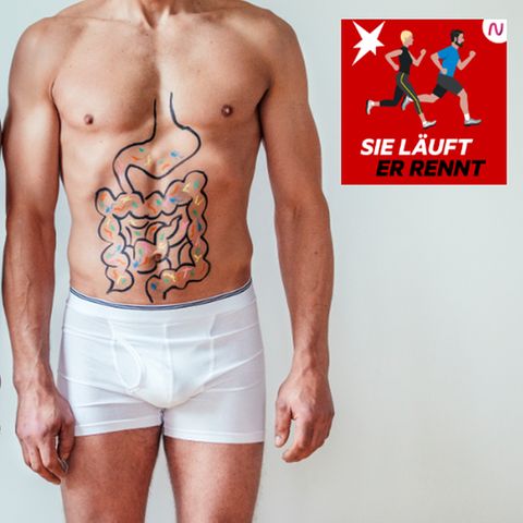Eine Frau und ein Mann mit auf dem Bauch gemalten Verdauungsorganen