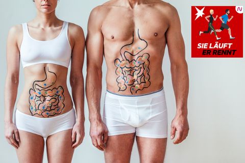 Eine Frau und ein Mann mit auf dem Bauch gemalten Verdauungsorganen
