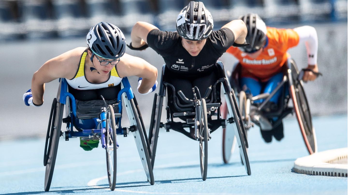 Paralympische Spiele Tokio 2021: Merle Marie Menje (l.), Leichtathletin. Behinderung: Spina Bifida. Nach ihrem sehr erfolgreichen Debüt bei den Europameisterschaften bezeichnete sie das Internationale Paralympische Komitee als "German Wunderkind". Sie gewann bei der EM zwei Goldmedaillen (Rennen über 400 und 5000 Meter) und zwei Silbermedaillen (über 100 und 800 Meter). Merle Marie Menje (l.), Leichtathletin. Behinderung: Spina Bifida. Nach ihrem sehr erfolgreichen Debüt bei den Europameisterschaften bezeichnete sie das Internationale Paralympische Komitee als "German Wunderkind". Sie gewann bei der EM zwei Goldmedaillen (Rennen über 400 und 5000 Meter) und zwei Silbermedaillen (über 100 und 800 Meter).