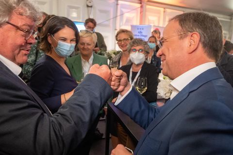 Laschet und Baerbock im Lager der Grünen