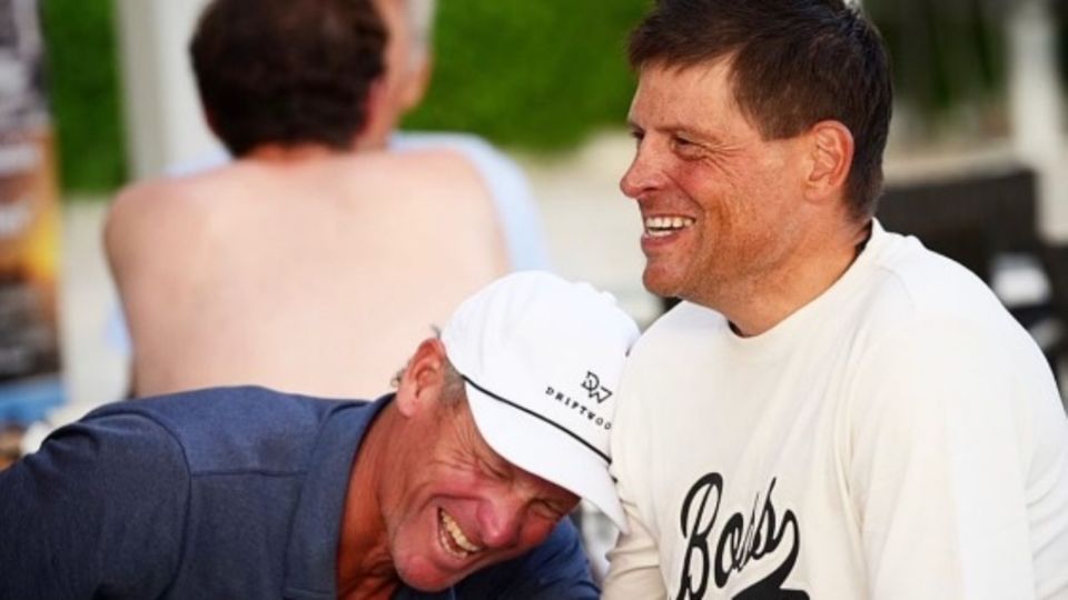 Former cycling pros Lance Armstrong (left) and Jan Ullrich