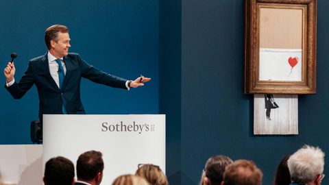 Auktionshaus Sotheby‘s: Banksy-Bild wird für 1,2 Millionen ersteigert und schreddert sich sofort selbst