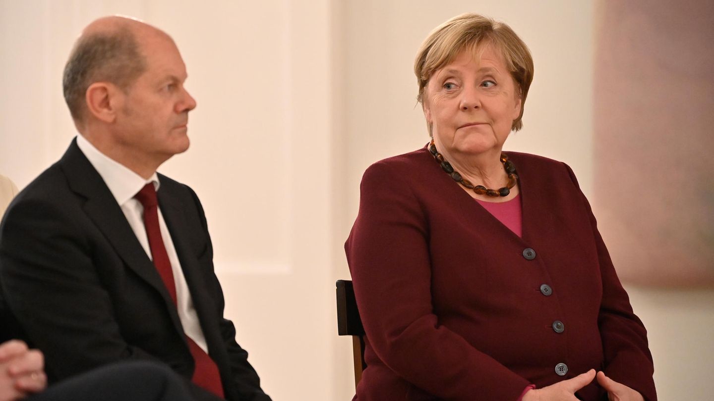 Chancellor Angela Merkel attends to the traffic lights