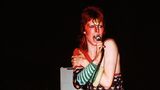 "Lady Stardust": "The boy in the bright blue jeans / Jumped up on the stage / And lady stardust sang his songs / Of darkness and disgrace