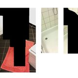 Ein weiterer Tatort ist dieses Badezimmer mit schwarzen Fließen und einem roten Duschvorleger