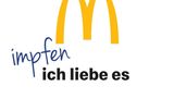 Vor ihren eigentlichen Claim "Ich liebe es" hat die Fastfoodkette McDonald's das Wort "impfen" gesetzt. 
