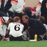 1996 folgt Vogts großer Triumph als Bundestrainer, als er in England Europameister wird. Vor der Verlängerung im Finale gegen Tschechien gibt er letzte Anweisungen an seinen verlängerten Arm auf dem Platz, Matthias Sammer. 1998 tritt er nach dem Viertelfinal-Aus bei der WM in Frankreich zurück. Danach trainierte er noch die Nationalteams von Kuwait, Schottland, Nigeria und Aserbaidschan. Über sein Image in den Medien sagte er mal: "Wenn ich übers Wasser laufen würde, sagen meine Kritiker: Nicht mal schwimmen kann der."