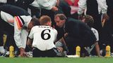 1996 folgt Vogts großer Triumph als Bundestrainer, als er in England Europameister wird. Vor der Verlängerung im Finale gegen Tschechien gibt er letzte Anweisungen an seinen verlängerten Arm auf dem Platz, Matthias Sammer. 1998 tritt er nach dem Viertelfinal-Aus bei der WM in Frankreich zurück. Danach trainierte er noch die Nationalteams von Kuwait, Schottland, Nigeria und Aserbaidschan. Über sein Image in den Medien sagte er mal: "Wenn ich übers Wasser laufen würde, sagen meine Kritiker: Nicht mal schwimmen kann der."