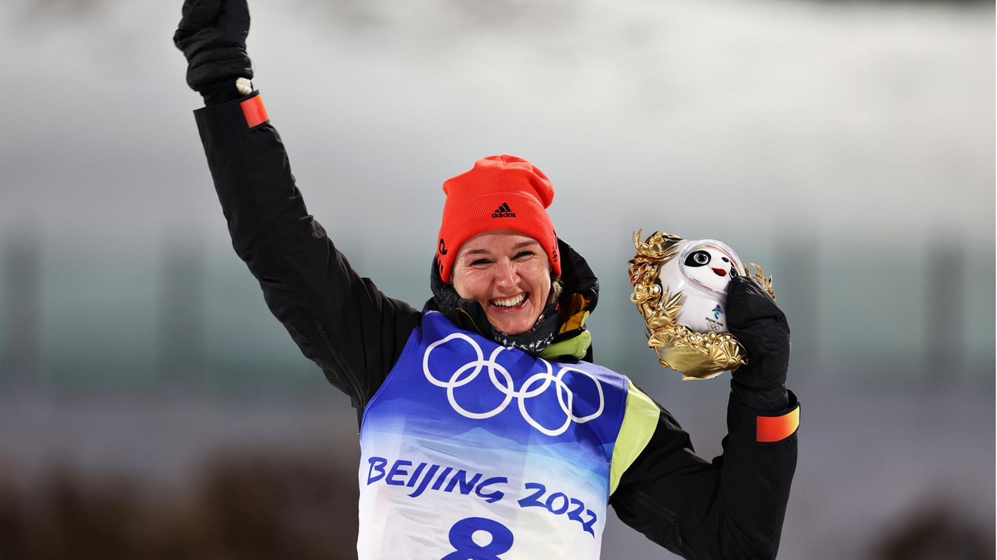 Winter Games 2022: Biathlete Denise Herrmann wins gold over 15 kilometers