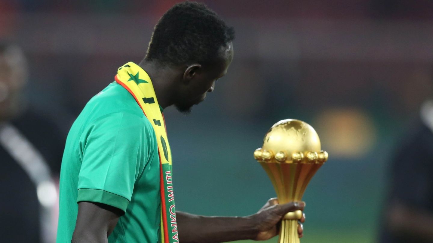 Sadio Mane of Senegal touches the trophy during the 2021 Africa Cup of Nations.