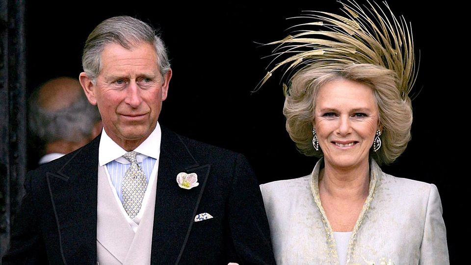 Prince Charles and Camilla arm in arm