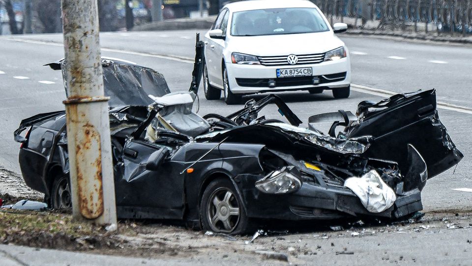 Ukraine: Car run over by tanks in Kiev Ukraine: Car run over by tanks in Kiev