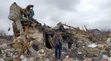 Gesicher Krieg - Mann und Trümmer in Schytormyr