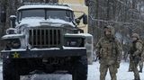Gesicher Krieg - Ukrainische Soldaten russischer Lkw
