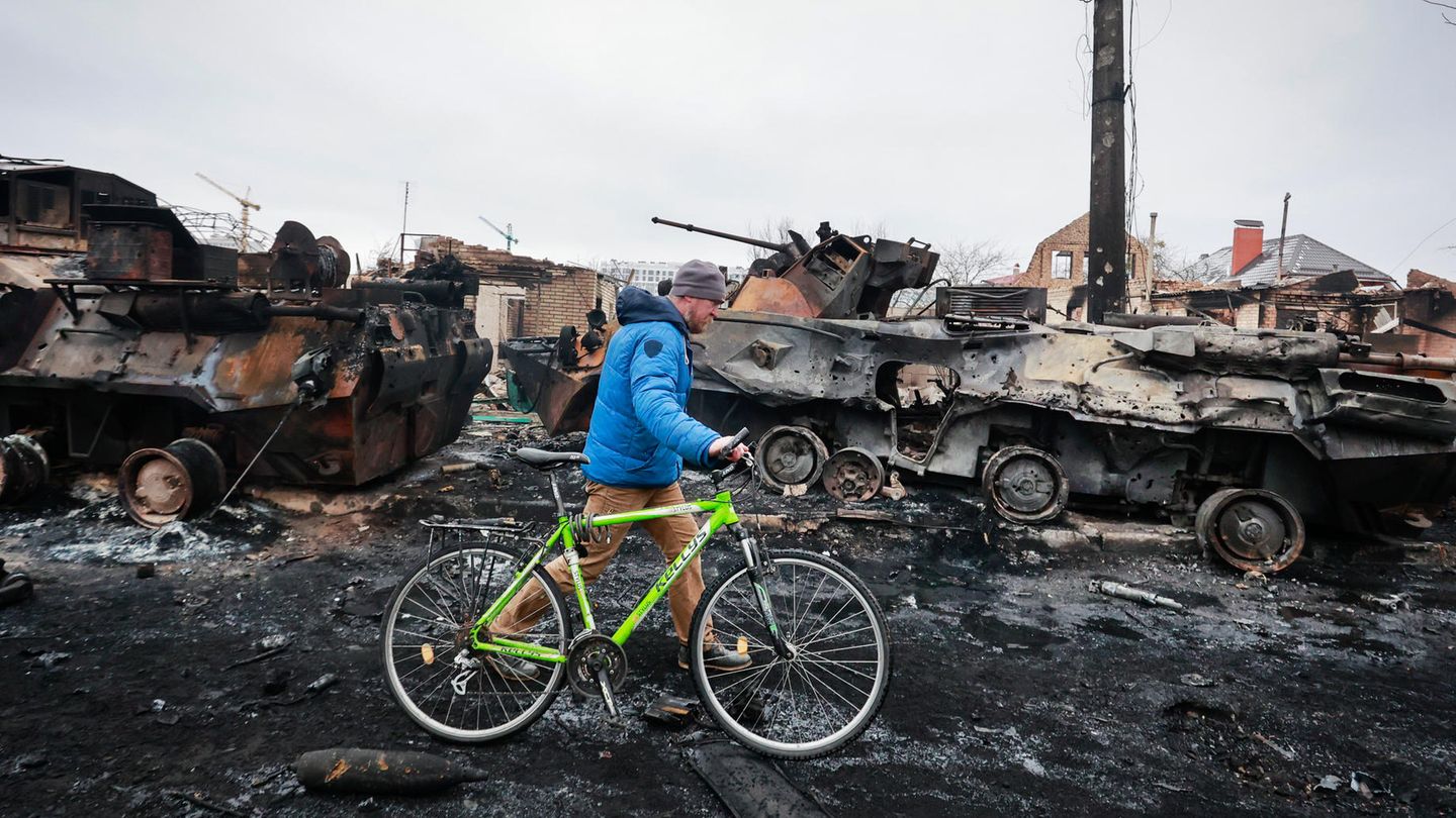 Gesichter Krieg - bunter Fahrradfahrer