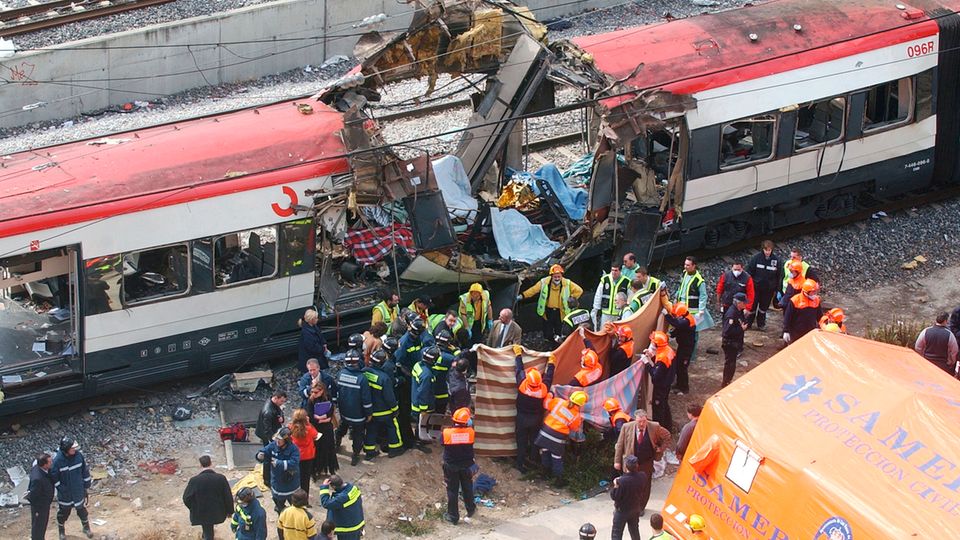 Terrorism Memorial Day Rescuers evacuate victims after the 2004 train attack in Madrid