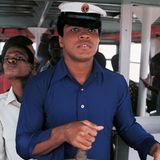 Muhammad Ali beim Schaufelraddampfer steuern im Kongo