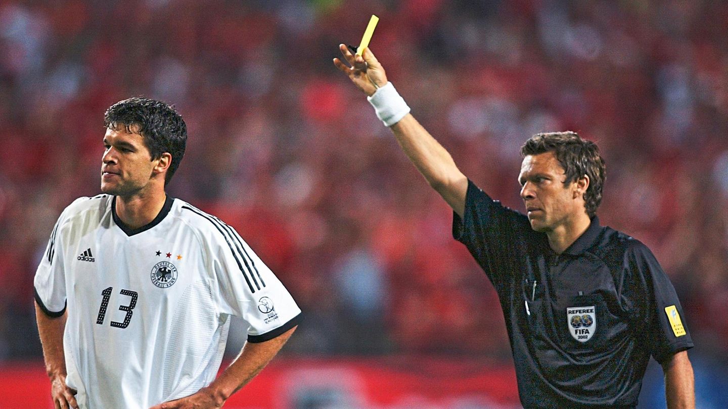 SEOUL - JUNE 25:  Referee Urs Meier of Switzerland shows the yellow card to Michael Ballack of Germany which due to a previous booking means he will miss the final during the FIFA World Cup Finals 2002 Semi-Final match between Germany and South Korea pl...