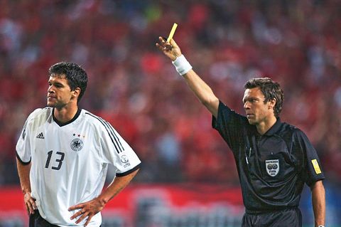 SEOUL - JUNE 25:  Referee Urs Meier of Switzerland shows the yellow card to Michael Ballack of Germany which due to a previous booking means he will miss the final during the FIFA World Cup Finals 2002 Semi-Final match between Germany and South Korea pl...