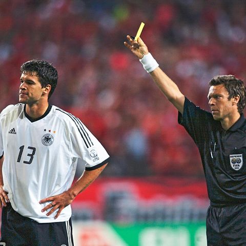 SEOUL - JUNE 25:  Referee Urs Meier of Switzerland shows the yellow card to Michael Ballack of Germany which due to a previous booking means he will miss the final during the FIFA World Cup Finals 2002 Semi-Final match between Germany and South Korea pl...