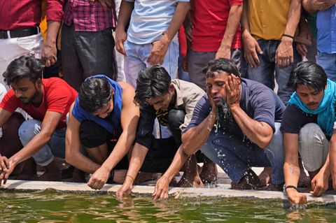 Rekordtemperaturen: "Wir halten es nicht aus": Indien leidet unter Hitzewelle – sogar die Bürgersteige schmelzen