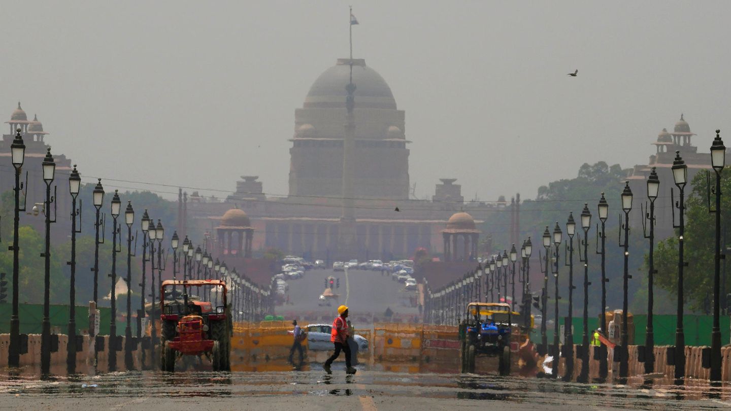 Die Straßen in Neu Delhi flimmern Die Straßen in Neu Delhi flimmern